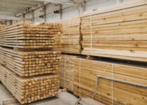 Large,Stacks,Of,Timber,Planks,And,Square,Studs,Create,An Large,Stacks,Of,Timber,Planks,And,Square,Studs,Create,An