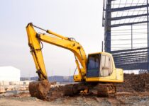 Excavate,Digger,Hydraulic,Vehicle,Machinery,Is,Leveling,The,Ground,Inside Excavate,Digger,Hydraulic,Vehicle,Machinery,Is,Leveling,The,Ground,Inside