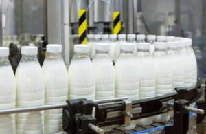Factory,Producing,Milk,Or,Yogurt,In,To,Plastic,Bottles,On